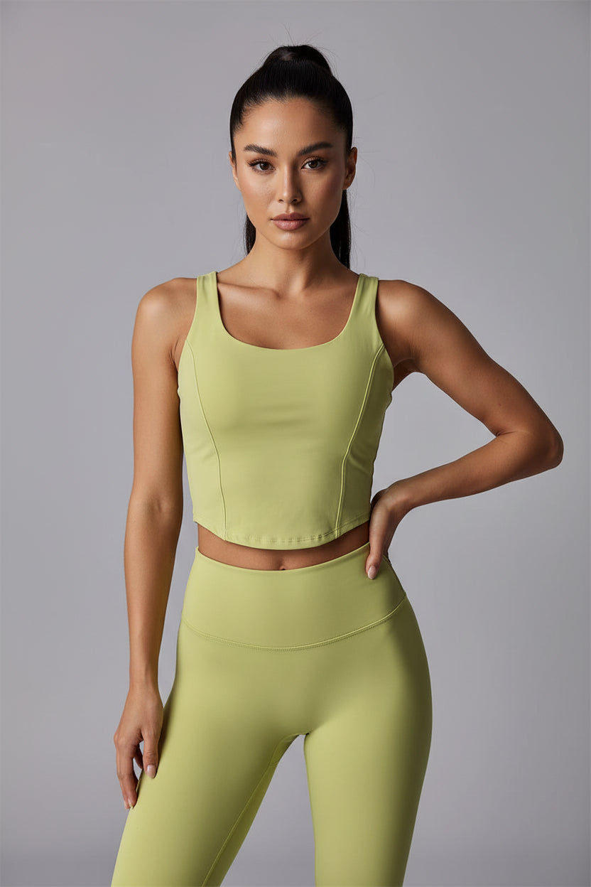 Green tank top on a gray background